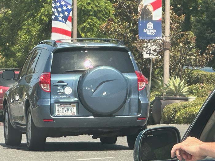 H2OWMN1 vanity license plate meaning Water Woman Won